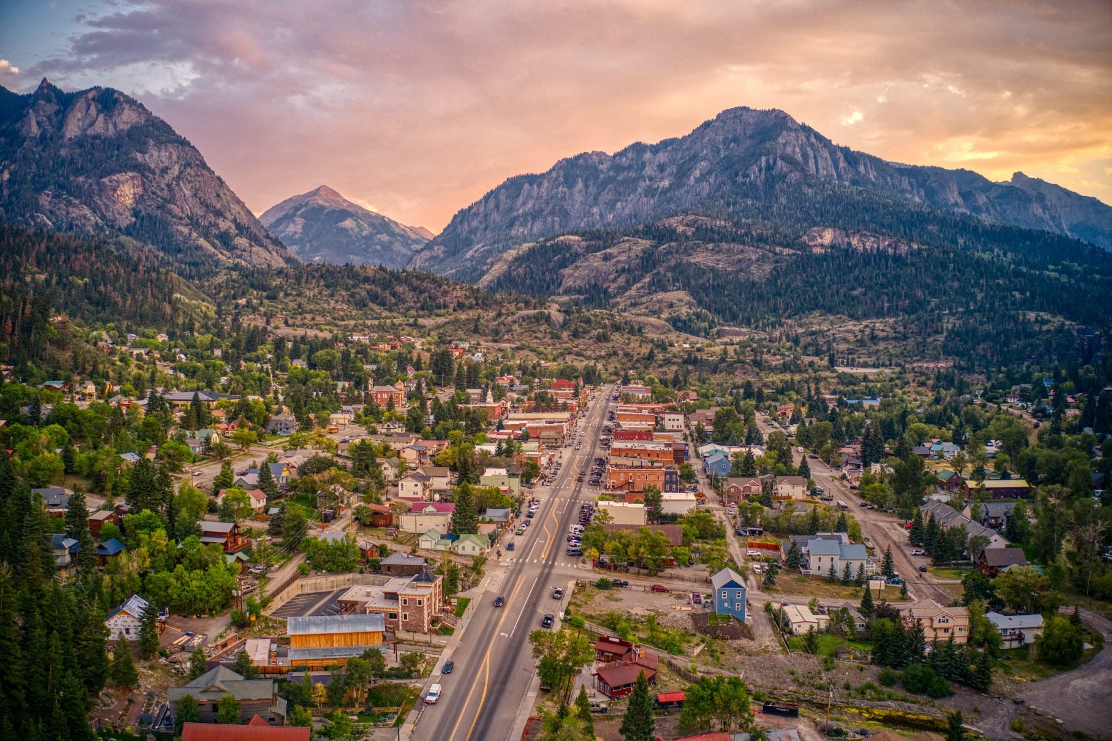 Mountain town in a Colorado valley at sunset